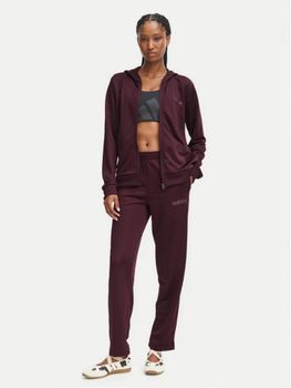 Tuta Adidas KQ7588 da donna bordeaux.